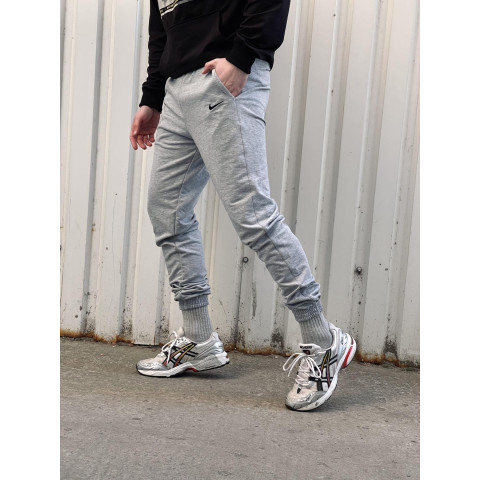 Штани чоловічі трикотажні Nike світло-сірі